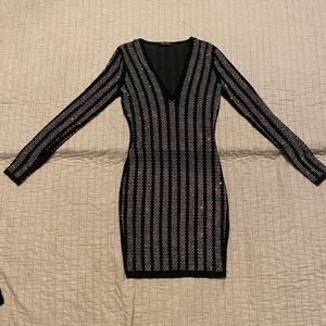 Size S Hot Miami Styles see through black dress. Long. Sleeve. Iridescent stones
